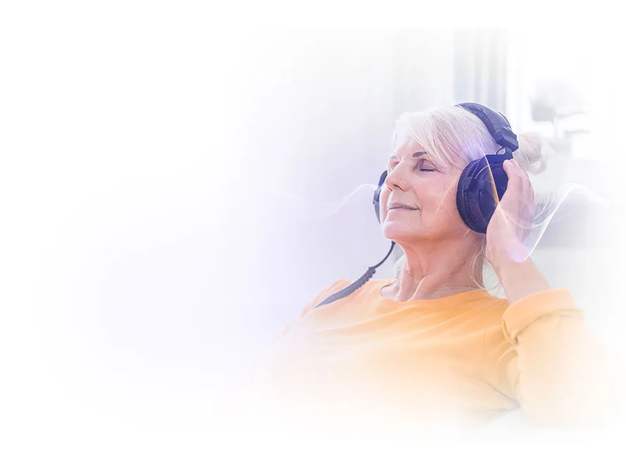 Person using headphones to listen to binaural beats for focus